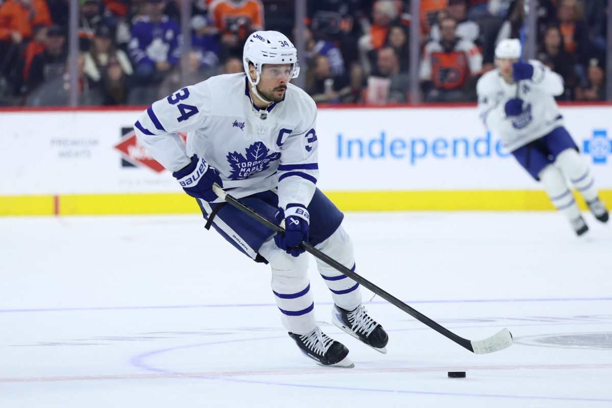 Jan 8, 2026; Philadelphia, Pennsylvania, USA; Toronto Maple Leafs center Auston Matthews (34) skates with the puck against the Philadelphia Flyers during overtime at Xfinity Mobile Arena. Mandatory Credit: Bill Streicher-Imagn Images