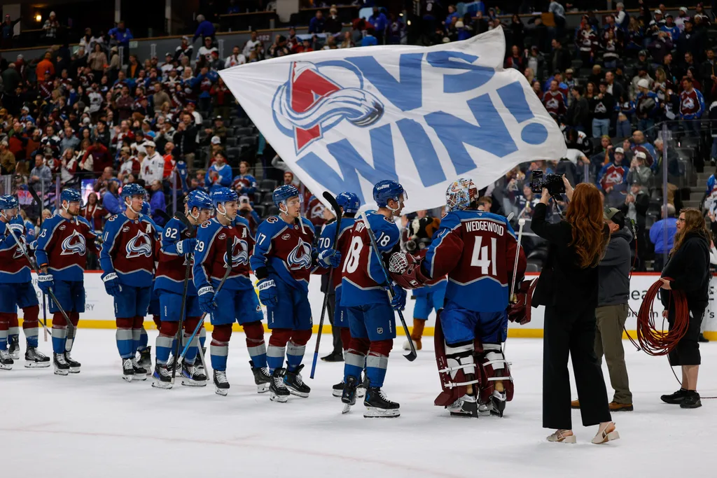 Jan 8, 2026; Denver, Colorado, USA; Colorado Avalanche players celebrate after the game against the Ottawa Senators at Ball Arena. Mandatory Credit: Isaiah J. Downing-Imagn Images