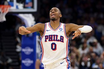 Jan 9, 2026; Orlando, Florida, USA; Philadelphia 76ers guard Tyrese Maxey (0) reacts after making a threee point shot against the Orlando Magic in the fourth quarter at Kia Center. Mandatory Credit: Nathan Ray Seebeck-Imagn Images