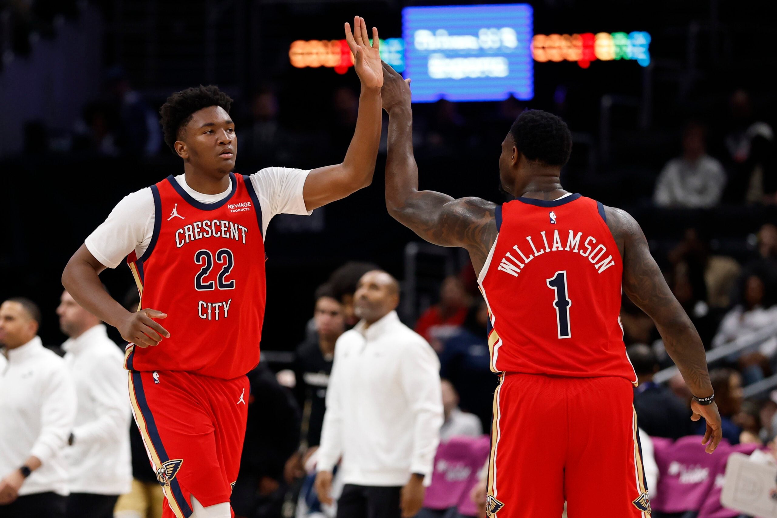 Jan 9, 2026; Washington, District of Columbia, USA; New Orleans Pelicans center Derik Queen (22) celebrates with Pelicans forward Zion Williamson (1) against the Washington Wizards in the second half at Capital One Arena. Mandatory Credit: Geoff Burke-Imagn Images