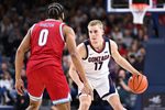 Jan 4, 2026; Spokane, Washington, USA;Gonzaga Bulldogs guard Mario Saint-Supery (17) controls the ball against Loyola Marymount Lions guard Nakyel Shelton (0)  in the second half at McCarthey Athletic Center. Mandatory Credit: James Snook-Imagn Images