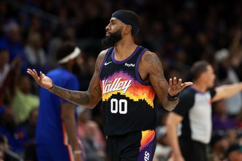 Jan 9, 2026; Phoenix, Arizona, USA; Phoenix Suns forward Royce O'Neale (00) reacts against the New York Knicks in the second half at Mortgage Matchup Center. Mandatory Credit: Mark J. Rebilas-Imagn Images