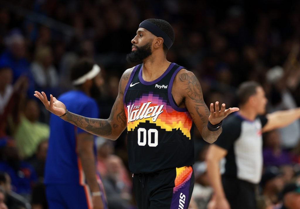 Jan 9, 2026; Phoenix, Arizona, USA; Phoenix Suns forward Royce O'Neale (00) reacts against the New York Knicks in the second half at Mortgage Matchup Center. Mandatory Credit: Mark J. Rebilas-Imagn Images