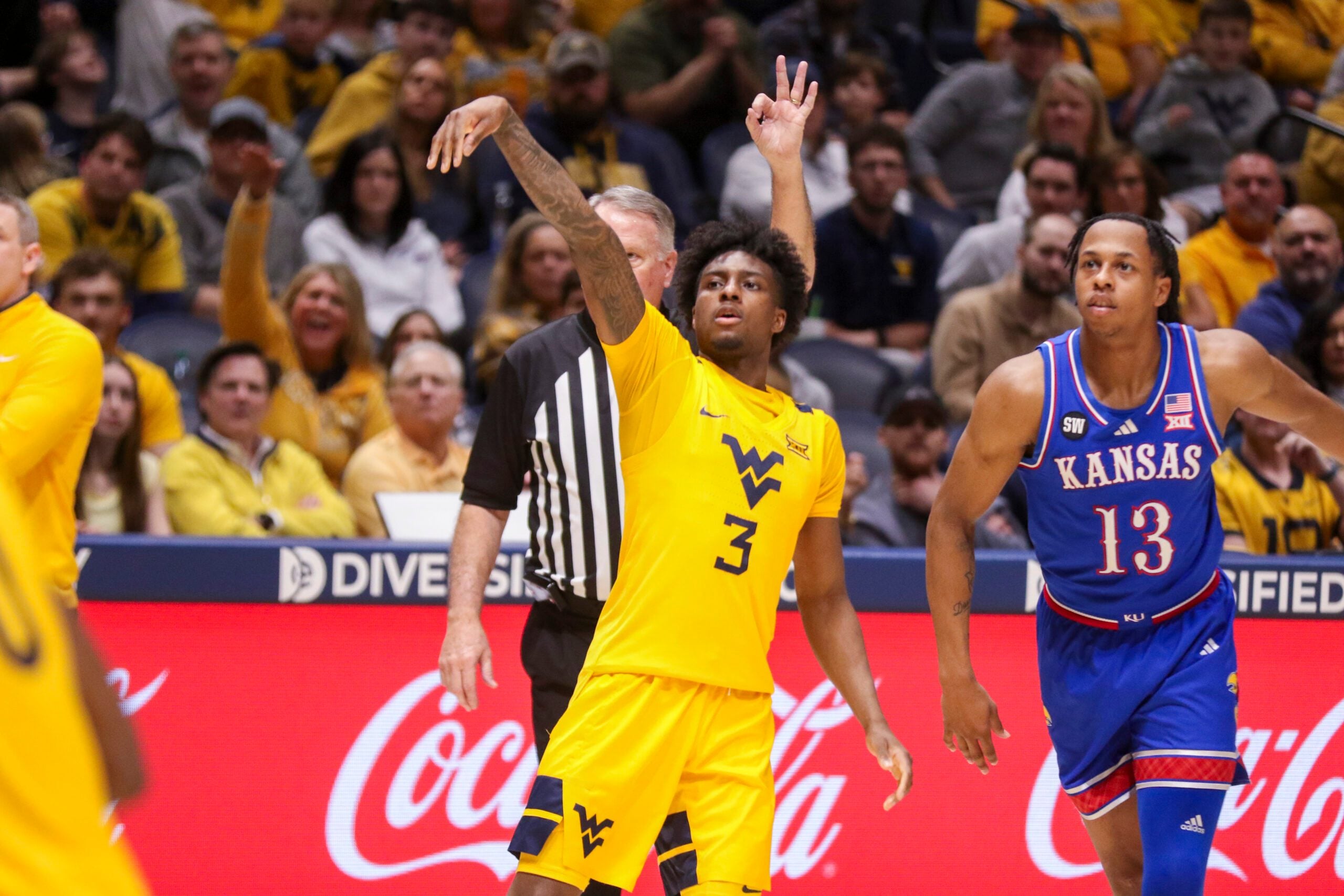 Jan 10, 2026; Morgantown, West Virginia, USA; West Virginia Mountaineers guard Honor Huff (3) shoots a three pointer during the second half against the Kansas Jayhawks at Hope Coliseum. Mandatory Credit: Ben Queen-Imagn Images