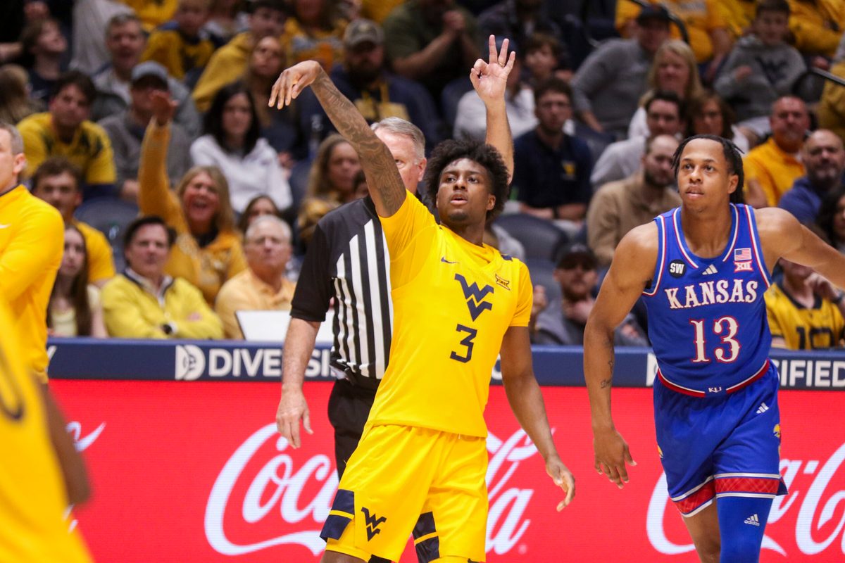 Jan 10, 2026; Morgantown, West Virginia, USA; West Virginia Mountaineers guard Honor Huff (3) shoots a three pointer during the second half against the Kansas Jayhawks at Hope Coliseum. Mandatory Credit: Ben Queen-Imagn Images