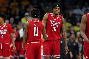 Jan 10, 2026; Boulder, Colorado, USA; Texas Tech Red Raiders guard Jaylen Petty (11) and forward JT Toppin (15) during the second half against the Colorado Buffaloes at CU Events Center. Mandatory Credit: Ron Chenoy-Imagn Images