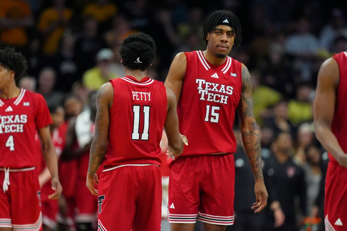 Jan 10, 2026; Boulder, Colorado, USA; Texas Tech Red Raiders guard Jaylen Petty (11) and forward JT Toppin (15) during the second half against the Colorado Buffaloes at CU Events Center. Mandatory Credit: Ron Chenoy-Imagn Images