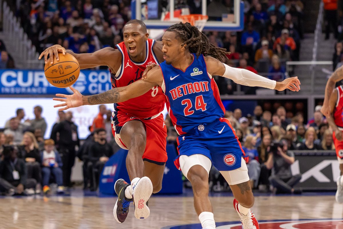 Jan 10, 2026; Detroit, Michigan, USA; Detroit Pistons guard Daniss Jenkins (24) defends against LA Clippers guard Kris Dunn (8) during the second half at Little Caesars Arena. Mandatory Credit: David Reginek-Imagn Images
