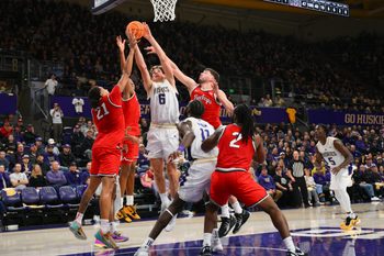 Jan 11, 2026; Seattle, Washington, USA; Washington Huskies forward Hannes Steinbach (6) shoots the ball during the first half against the Ohio State Buckeyes at Alaska Airlines Arena at Hec Edmundson Pavilion. Mandatory Credit: Steven Bisig-Imagn Images
