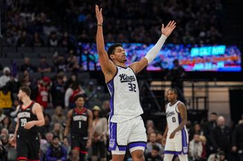 Jan 11, 2026; Sacramento, California, USA; Sacramento Kings center Dylan Cardwell (32) hypes up the crowd during the fourth quarter against the Houston Rockets at Golden 1 Center. Mandatory Credit: Justine Willard-Imagn Images