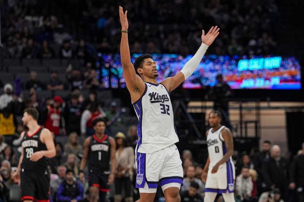 Jan 11, 2026; Sacramento, California, USA; Sacramento Kings center Dylan Cardwell (32) hypes up the crowd during the fourth quarter against the Houston Rockets at Golden 1 Center. Mandatory Credit: Justine Willard-Imagn Images