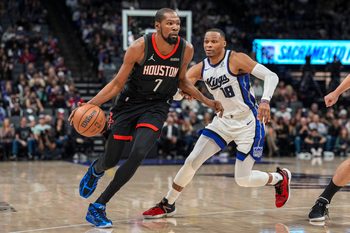 Jan 11, 2026; Sacramento, California, USA; Houston Rockets forward Kevin Durant (7) dribbles against Sacramento Kings guard Russell Westbrook (18) during the fourth quarter at Golden 1 Center. Mandatory Credit: Justine Willard-Imagn Images