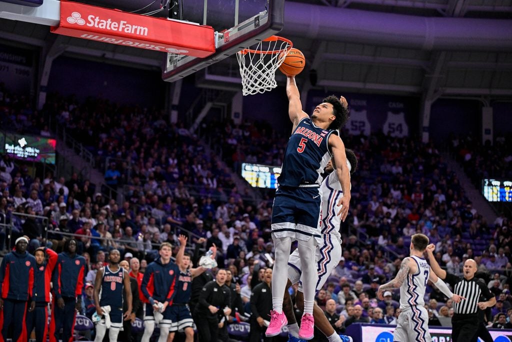 Jan 10, 2026; Fort Worth, Texas, USA; Arizona Wildcats guard Brayden Burries (5) dunks the ball during the game between the Horned Frogs and the Wildcats at Ed and Rae Schollmaier Arena. Mandatory Credit: Jerome Miron-Imagn Images