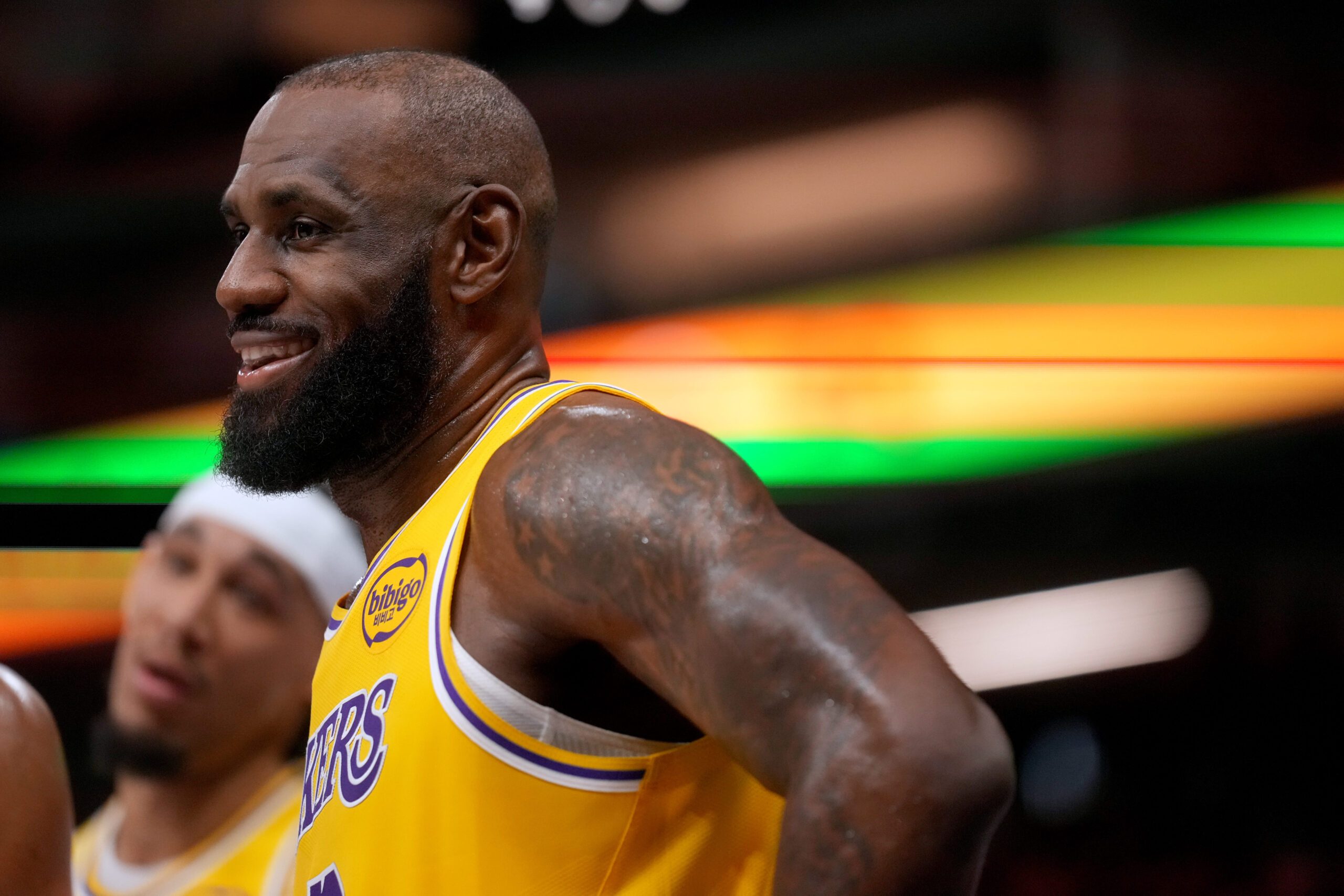 Jan 12, 2026; Sacramento, California, USA; Los Angeles Lakers forward LeBron James (23) smiles during a timeout against the Sacramento Kings in the fourth quarter at the Golden 1 Center. Mandatory Credit: Cary Edmondson-Imagn Images