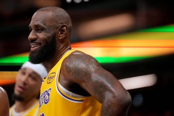 Jan 12, 2026; Sacramento, California, USA; Los Angeles Lakers forward LeBron James (23) smiles during a timeout against the Sacramento Kings in the fourth quarter at the Golden 1 Center. Mandatory Credit: Cary Edmondson-Imagn Images