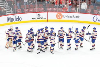 Jan 12, 2026; Chicago, Illinois, USA; Edmonton Oilers players celebrate after defeating the Chicago Blackhawks at United Center. Mandatory Credit: Kamil Krzaczynski-Imagn Images