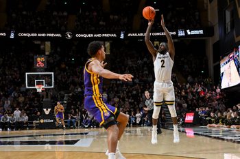 Jan 10, 2026; Nashville, Tennessee, USA;  Vanderbilt Commodores guard Duke Miles (2) shoots a three point basket against the Louisiana State Tigers during the second half at Memorial Gymnasium. Mandatory Credit: Steve Roberts-Imagn Images