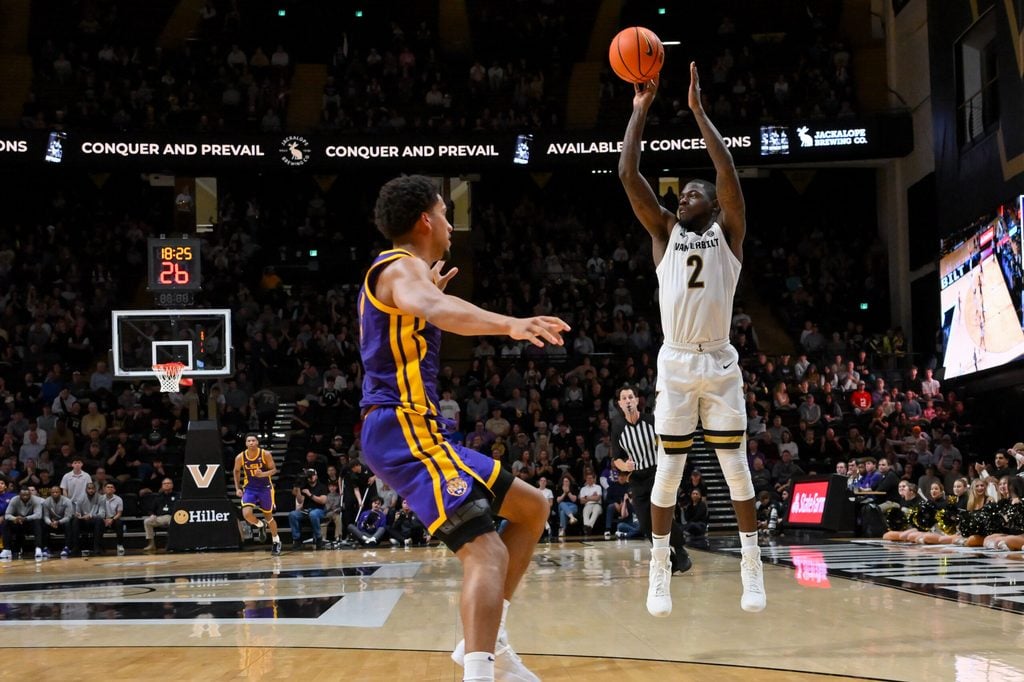 Jan 10, 2026; Nashville, Tennessee, USA; Vanderbilt Commodores guard Duke Miles (2) shoots a three point basket against the Louisiana State Tigers during the second half at Memorial Gymnasium. Mandatory Credit: Steve Roberts-Imagn Images