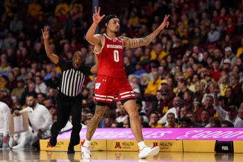 Jan 13, 2026; Minneapolis, Minnesota, USA; Wisconsin Badgers guard Braeden Carrington (0) celebrates his three-point basket against the Minnesota Golden Gophers during the first half at Williams Arena. Mandatory Credit: Matt Krohn-Imagn Images