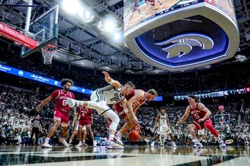 Michigan State's Jaxon Kohler, left, and Indiana's Tucker DeVries go after the ball during the first half on Tuesday, Jan. 13, 2026, at the Breslin Center in East Lansing.