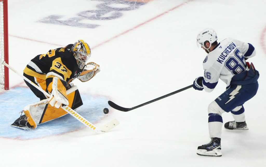 Jan 13, 2026; Pittsburgh, Pennsylvania, USA; Tampa Bay Lightning right wing Nikita Kucherov (86) scores a game winning shootout goal against Pittsburgh Penguins goaltender Arturs Silovs (37) at PPG Paints Arena. Mandatory Credit: Charles LeClaire-Imagn Images