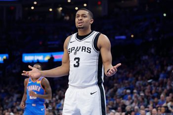 Jan 13, 2026; Oklahoma City, Oklahoma, USA; San Antonio Spurs forward/guard Keldon Johnson (3) reacts after a play against the Oklahoma City Thunder during the second half at Paycom Center. Mandatory Credit: Alonzo Adams-Imagn Images