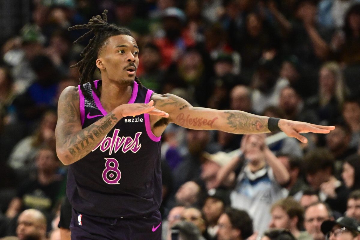 Jan 13, 2026; Milwaukee, Wisconsin, USA; Minnesota Timberwolves guard Bones Hyland (8) reacts after scoring a 3-point basket in the third quarter against the Milwaukee Bucks at Fiserv Forum. Mandatory Credit: Benny Sieu-Imagn Images