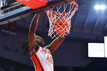 Jan 13, 2026; Syracuse, New York, USA; Syracuse Orange forward William Kyle III (42) dunks during the second half against the Florida State Seminoles at the JMA Wireless Dome. Mandatory Credit: Rich Barnes-Imagn Images