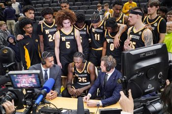Jan 14, 2026; Columbia, Missouri, USA; Missouri Tigers guard Mark Mitchell (25) is interviewed by media after the game against the Auburn Tigers at Mizzou Arena. Mandatory Credit: Denny Medley-Imagn Images