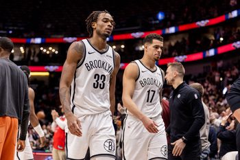 Jan 14, 2026; New Orleans, Louisiana, USA;  Brooklyn Nets forward Michael Porter Jr. (17) and center Nic Claxton (33) head to the locker room after the game against the New Orleans Pelicans at Smoothie King Center. Mandatory Credit: Stephen Lew-Imagn Images
