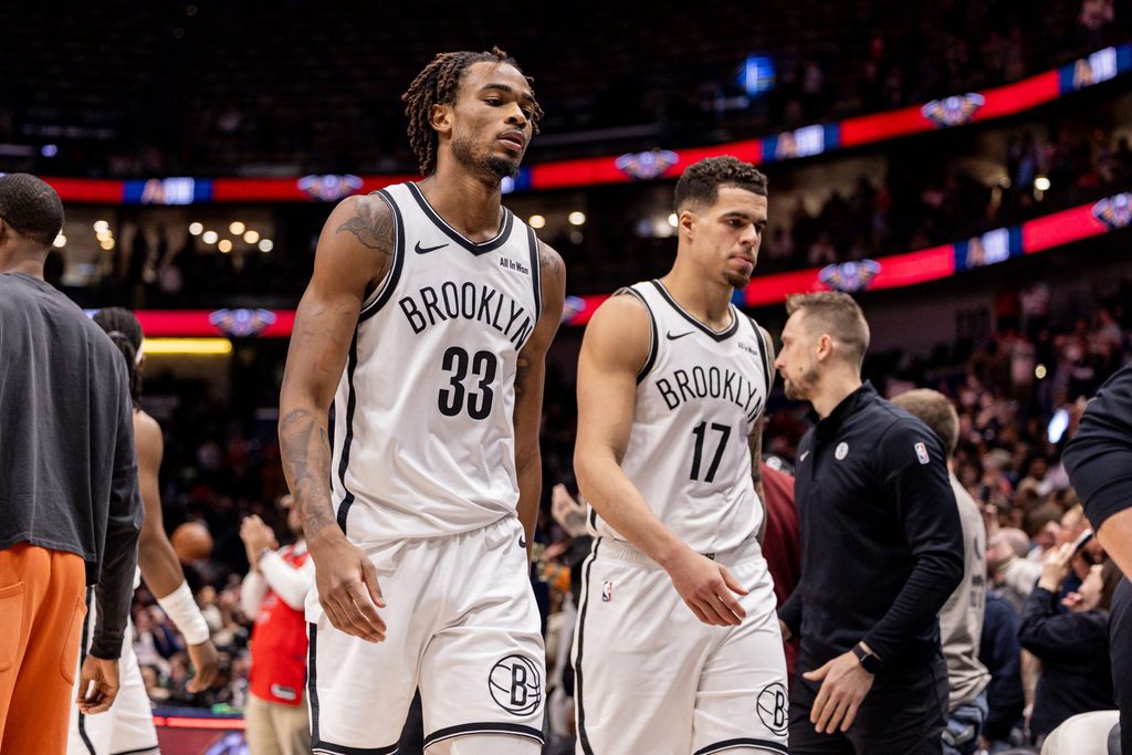 Jan 14, 2026; New Orleans, Louisiana, USA; Brooklyn Nets forward Michael Porter Jr. (17) and center Nic Claxton (33) head to the locker room after the game against the New Orleans Pelicans at Smoothie King Center. Mandatory Credit: Stephen Lew-Imagn Images