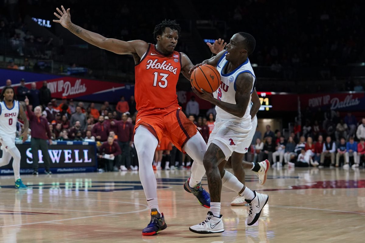 Jan 14, 2026; Dallas, Texas, USA; SMU Mustangs guard Boopie Miller (2) is fouled by Virginia Tech Hokies forward Amani Hansberry (13) during the second half at Moody Coliseum. Mandatory Credit: Raymond Carlin III-Imagn Images