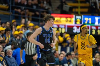 Jan 14, 2026; Berkeley, California, USA; Duke Blue Devils guard Nikolas Khamenia (14) celebrates after the basket against the California Golden Bears during the second half at Haas Pavilion. Mandatory Credit: Neville E. Guard-Imagn Images