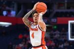 Jan 13, 2026; Syracuse, New York, USA; Syracuse Orange guard Nate Kingz (4) shoots during the second half against the Florida State Seminoles at the JMA Wireless Dome. Mandatory Credit: Rich Barnes-Imagn Images