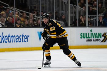 Jan 11, 2026; Boston, Massachusetts, USA; Boston Bruins center Fraser Minten (93) skates with the puck during the third period of the game against the Pittsburgh Penguins at TD Garden. Mandatory Credit: Natalie Reid-Imagn Images