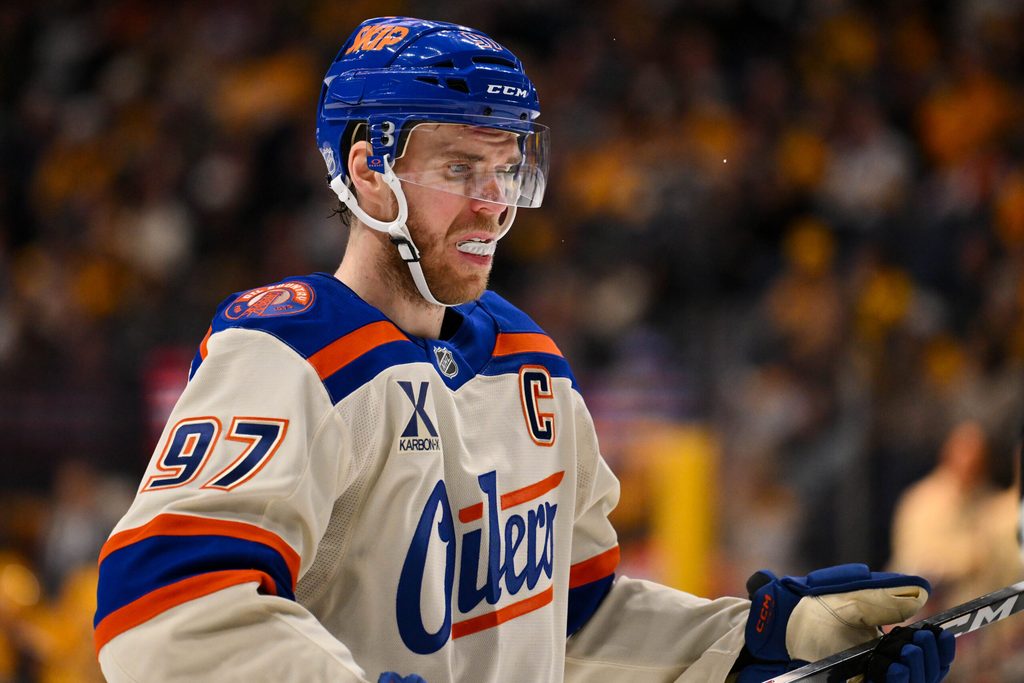 Jan 13, 2026; Nashville, Tennessee, USA; Edmonton Oilers center Connor McDavid (97) awaits the face off against the Nashville Predators during the second period at Bridgestone Arena. Mandatory Credit: Steve Roberts-Imagn Images