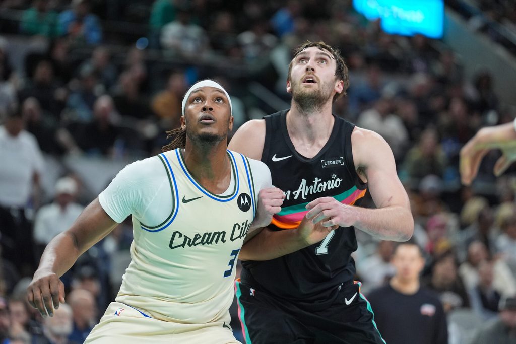 Jan 15, 2026; San Antonio, Texas, USA; Milwaukee Bucks center/forward Myles Turner (3) and San Antonio Spurs center/forward Luke Kornet (7) look to get a rebound in the first half at Frost Bank Center. Mandatory Credit: Daniel Dunn-Imagn Images