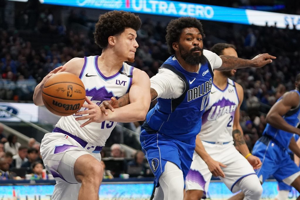Jan 15, 2026; Dallas, Texas, USA; Dallas Mavericks forward Naji Marshall (13) makes the steal on Utah Jazz guard Walter Clayton Jr. (13) during the second half at American Airlines Center. Mandatory Credit: Raymond Carlin III-Imagn Images