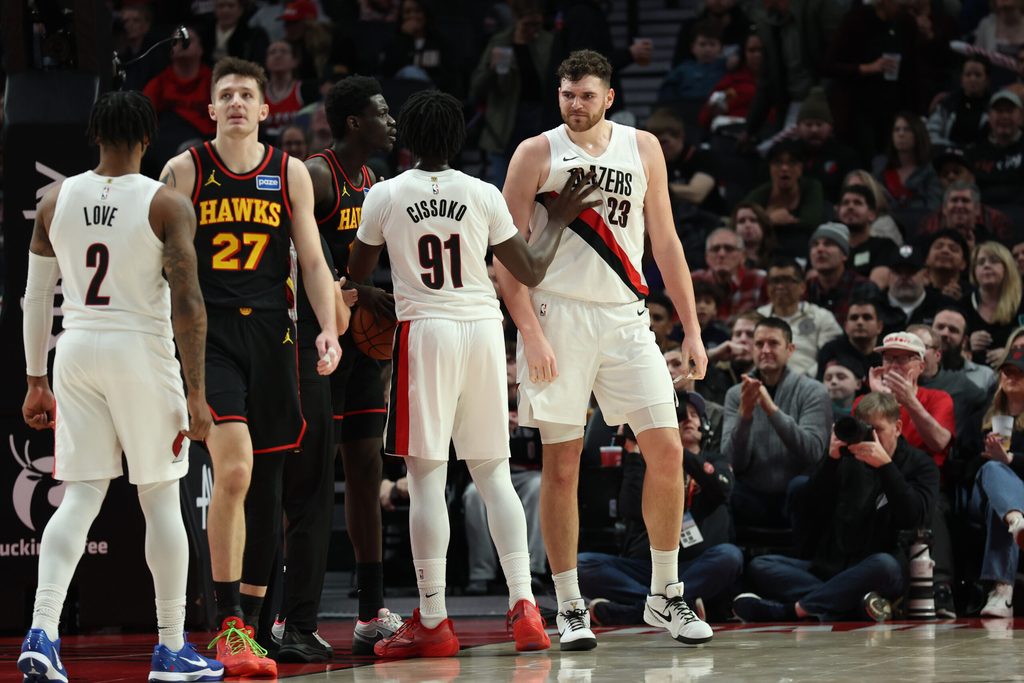 Jan 15, 2026; Portland, Oregon, USA; Portland Trail Blazers center Donovan Clingan (23) reacts after scoring against the Atlanta Hawks during the second half at Moda Center. Mandatory Credit: Jaime Valdez-Imagn Images