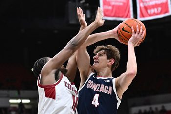 Jan 15, 2026; Pullman, Washington, USA; Gonzaga Bulldogs guard Davis Fogle (4) shoots the ball against Washington State Cougars guard Jerone Morton (11) in the second half at Friel Court at Beasley Coliseum. Gonzaga Bulldogs won 86-65. Mandatory Credit: James Snook-Imagn Images