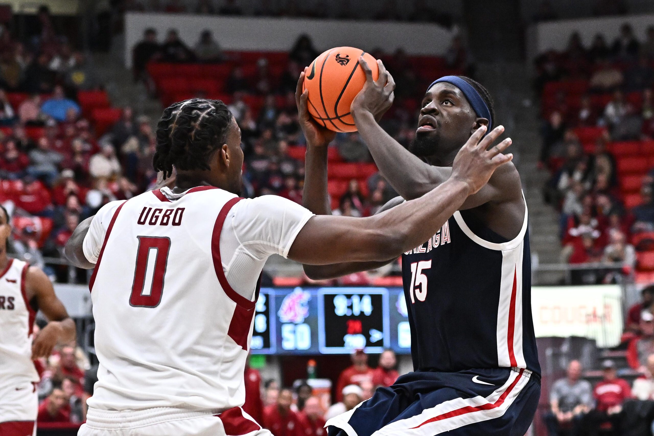 Jan 15, 2026; Pullman, Washington, USA; Gonzaga Bulldogs forward Graham Ike (15) shoots the ball against Washington State Cougars forward Emmanuel Ugbo (0) in the second half at Friel Court at Beasley Coliseum. Gonzaga Bulldogs won 86-65. Mandatory Credit: James Snook-Imagn Images