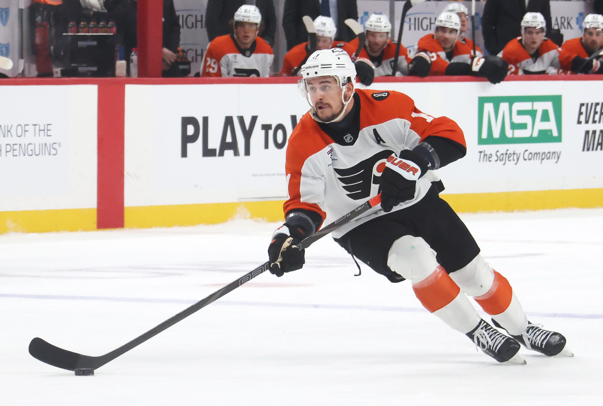 Jan 15, 2026; Pittsburgh, Pennsylvania, USA;  Philadelphia Flyers right wing Travis Konecny (11) moves the puck against the Pittsburgh Penguins during the first period at PPG Paints Arena. Mandatory Credit: Charles LeClaire-Imagn Images