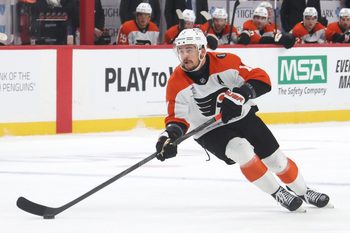 Jan 15, 2026; Pittsburgh, Pennsylvania, USA;  Philadelphia Flyers right wing Travis Konecny (11) moves the puck against the Pittsburgh Penguins during the first period at PPG Paints Arena. Mandatory Credit: Charles LeClaire-Imagn Images