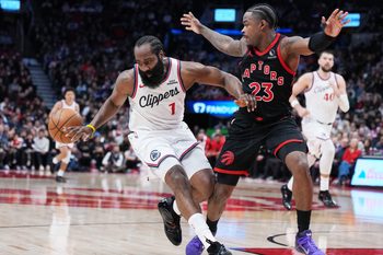 Jan 16, 2026; Toronto, Ontario, CAN; LA Clippers guard James Harden (1) controls the ball as Toronto Raptors guard Jamal Shead (23) tries to defend during the fourth quarter at Scotiabank Arena. Mandatory Credit: Nick Turchiaro-Imagn Images