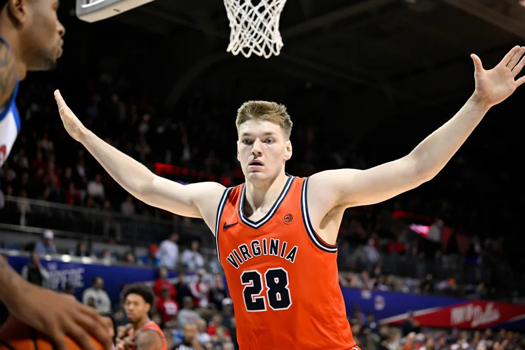 Jan 17, 2026; Dallas, Texas, USA; Virginia Cavaliers forward Thijs de Ridder (28) defends against the in bound pass by SMU Mustangs during the first half at Moody Coliseum. Mandatory Credit: Jerome Miron-Imagn Images