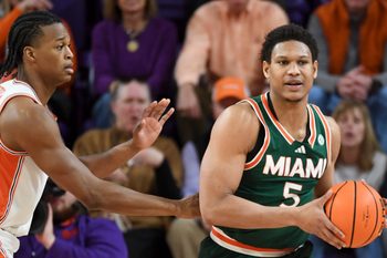 Clemson Tigers forward RJ Godfrey (0) defends Miami Hurricanes forward Malik Reneau (5) Saturday, Jan. 17, 2026, during the NCAA men’s basketball game at Littlejohn Coliseum in Clemson, South Carolina.