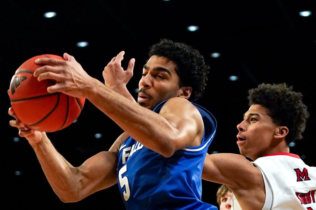 Buffalo Bulls guard Daniel Freitag (5) rebounds the ball in the first half of a NCAA men’s basketball game between the Miami RedHawks and Buffalo Bulls, Saturday, Jan. 17, 2026, at Millett Hall in Oxford, Oh.