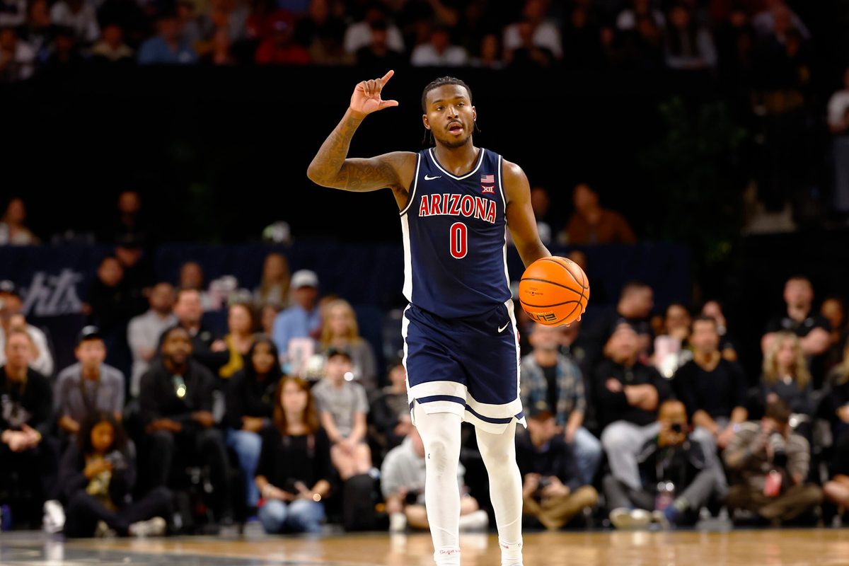 Jan 17, 2026; Orlando, Florida, USA;  Arizona Wildcats guard Jaden Bradley (0) calls a play during the second half against the Central Florida Knights at Addition Financial Arena. Mandatory Credit: Russell Lansford-Imagn Images