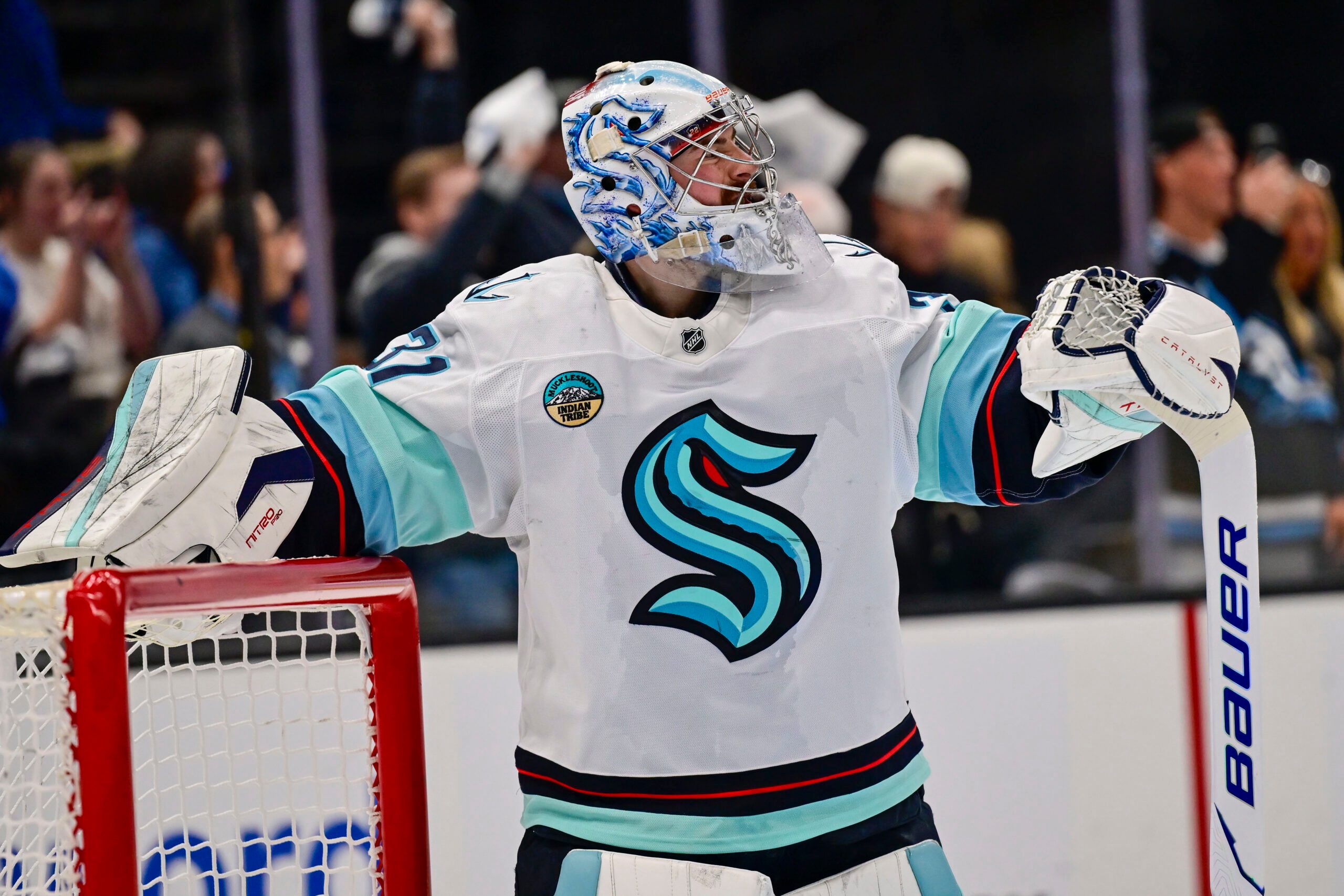 Jan 17, 2026; Salt Lake City, Utah, USA; Seattle Kraken goalie Philipp Grubauer (31) watches the replay of the goal scored on him during the second period by the Utah Mammoth at Delta Center. Mandatory Credit: Peter Creveling-Imagn Images