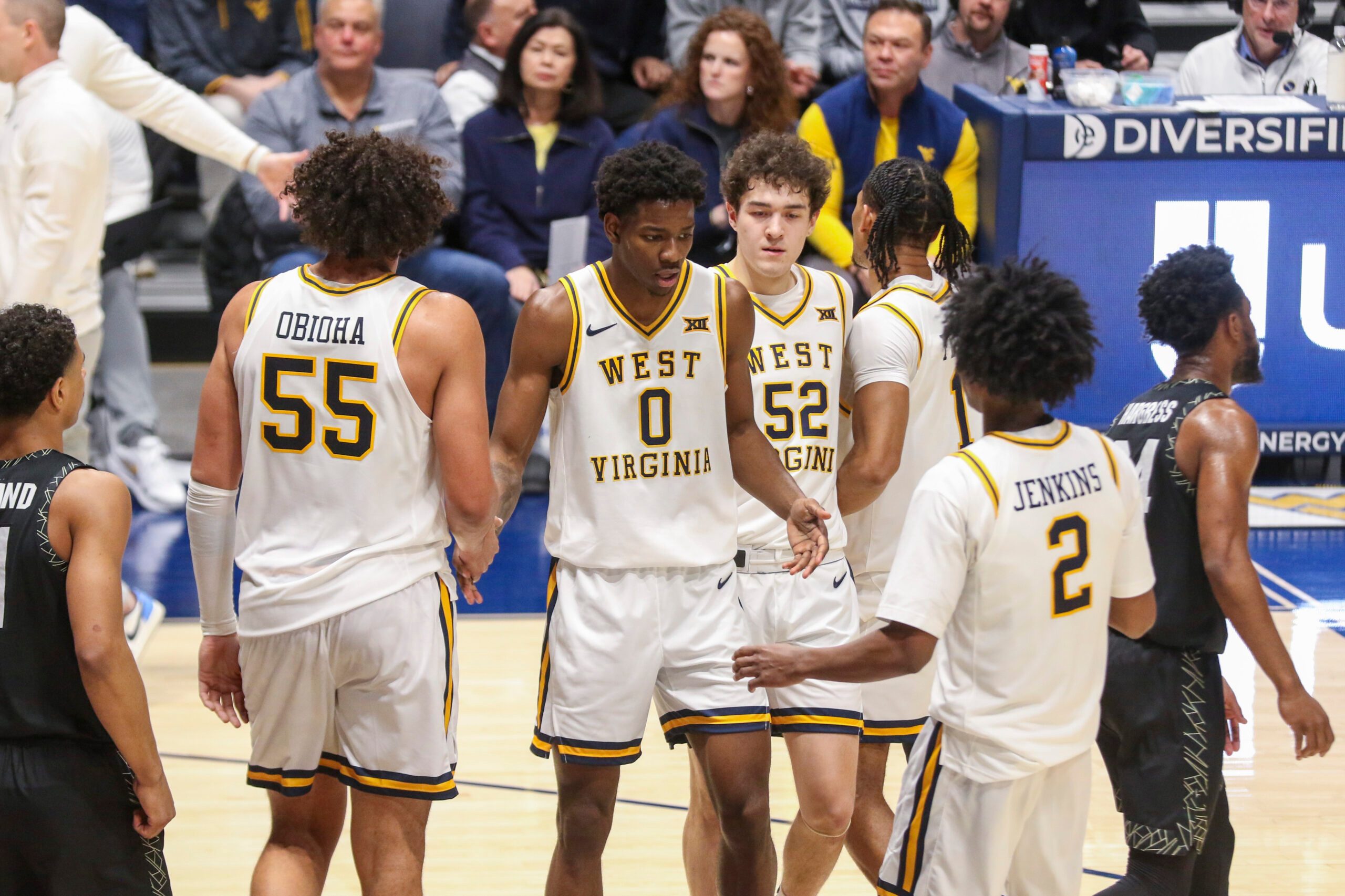 Jan 17, 2026; Morgantown, West Virginia, USA; West Virginia Mountaineers forward Brenen Lorient (0) celebrates with teammates during the second half against the Colorado Buffaloes at Hope Coliseum. Mandatory Credit: Ben Queen-Imagn Images